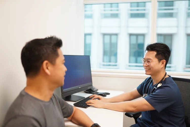 50-year-old Asian man going for subsidised screening for chronic diseases under Screen for Life (SFL) at ATA Medical.