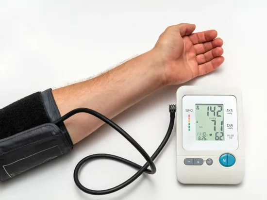 Blood pressure of a man being measured over a period of time to assess for hypertension.