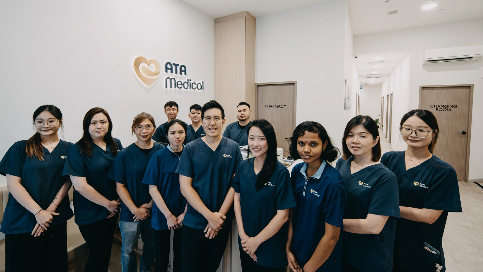 ATA Medical staff group photo taking at reception area.