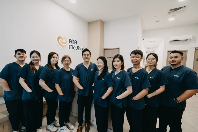 ATA Medical Tanjong Pagar Clinic team of doctors and staff standing together in the clinic lobby.