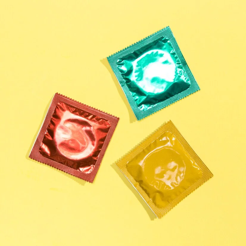 Condoms used for protected sex reducing risk of STDs.