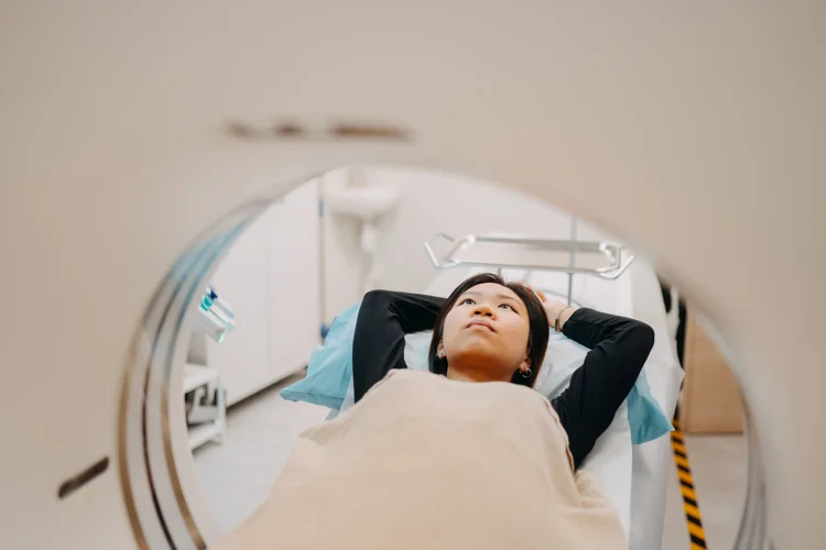 Female patient undergoing CT Scan procedure at ATA Medical (Camden).