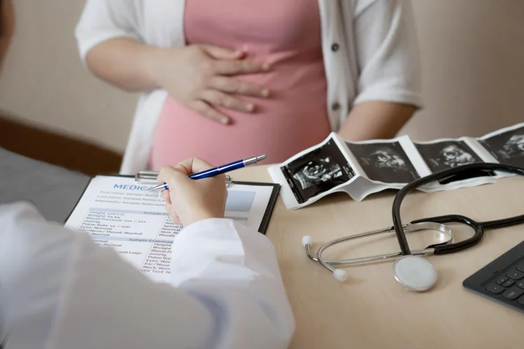 Gynaecologist reviewing baby's health for STDs.