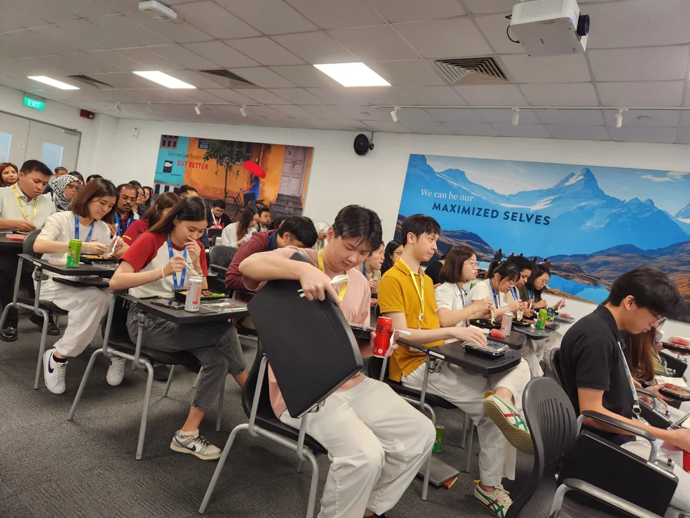 MNC employees having a lunch break during their health screening talk session.