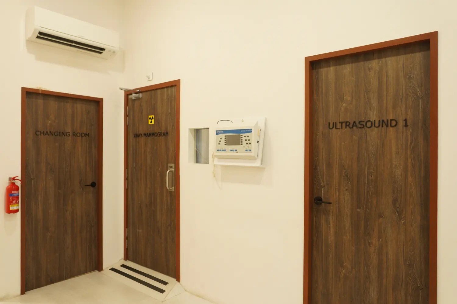 Scanning and changing area with X-Ray, Mammogram, and ultrasound scan rooms